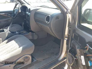 2003 GMC Envoy SLE with VIN 1GKDS13S532176330, listed as a IAAI auction lot 41757554 with 274,878 mi miles. Bid and sale history available at carsss.com. Image 5.