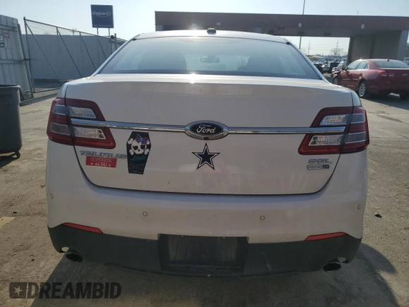 2016 Ford Taurus SEL with VIN 1FAHP2H89GG122884, listed as a Copart auction lot 53597595 with 128,627 mi miles and Salvage title. Bid and sale history available at DreamBid. Image 6.