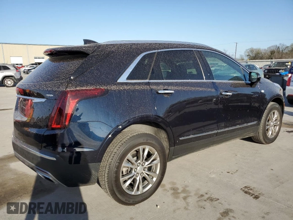 2021 Cadillac XT5 FWD Premium Luxury with VIN 1GYKNCRS5MZ138712, listed as a Copart auction lot 49697945 with 54,893 mi miles and Salvage Title. Bid and sale history available at carsss.com. Image 3.