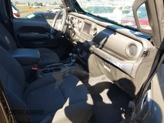 2023 Jeep Wrangler Willys with VIN 1C4HJXDN0PW597768, listed as a IAAI auction lot 41645815 with 23,717 mi miles and . Bid and sale history available at DreamBid. Image 5.