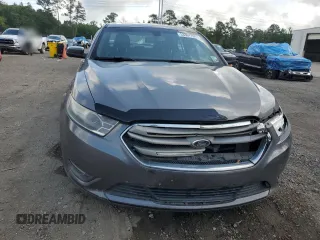 2014 Ford Taurus SEL with VIN 1FAHP2E84EG123006, listed as a Copart auction lot 53367795 with 216,092 mi miles and Salvage Title. Bid and sale history available at carsss.com. Image 5.