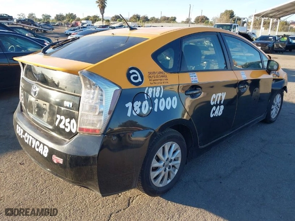 2014 Toyota Prius Plug-In with VIN JTDKN3DP6E3054041, listed as a IAAI auction lot 41143461 with 348,162 mi miles. Bid and sale history available at carsss.com. Image 4.