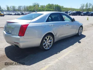 2014 Cadillac CTS Performance AWD z VIN 1G6AY5S38E0185345, wystawiony jako IAAI lot #42216924 z przebiegiem 141 654 mil mil oraz . Historia ofert i sprzedaży dostępna na DreamBid. Obrazek 4.