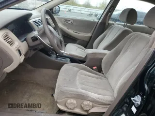 2000 Honda Accord LX z VIN 1HGCG5648YA154043, wystawiony jako Copart lot #51854515 z przebiegiem 176 150 mil mil oraz Szkoda całkowita • Salvage title. Historia ofert i sprzedaży dostępna na DreamBid. Obrazek 7.