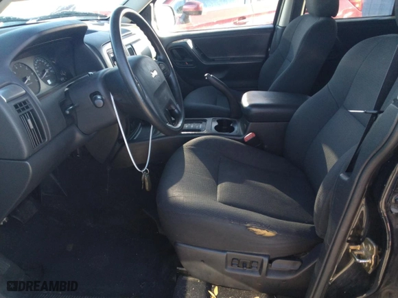 2002 Jeep Grand Cherokee Laredo with VIN 1J4GW48S82C241889, listed as a Copart auction lot 46252045 with 215,697 mi miles and Salvage Title. Bid and sale history available at carsss.com. Image 7.