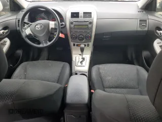 2010 Toyota Corolla with VIN 1NXBU4EE1AZ377581, listed as a Copart auction lot 52578805 with 242,776 mi miles and Salvage Title. Bid and sale history available at DreamBid. Image 8.
