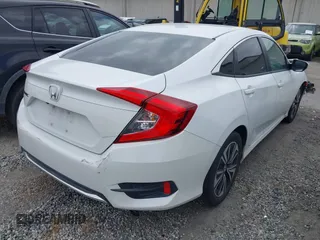 2020 Honda Civic LX with VIN 2HGFC2F64LH593100, listed as a IAAI auction lot 41877572 with 76,713 mi miles and . Bid and sale history available at DreamBid. Image 4.