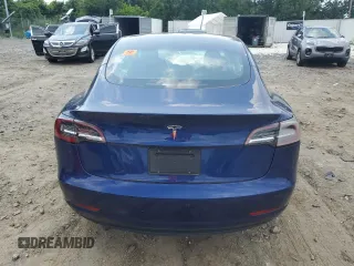 2023 Tesla Model 3 с VIN 5YJ3E1EA3PF426945, выставлен на аукционе Copart как лот 62584185 с пробегом Не указан миль и Списание • Salvage title. История ставок и продаж доступна на DreamBid. Изображение 6.