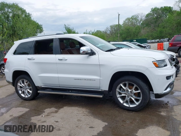 2015 Jeep Grand Cherokee Summit with VIN 1C4RJFJG5FC104087, listed as a IAAI auction lot 42100298 with 88,710 mi miles and . Bid and sale history available at DreamBid. Image 13.