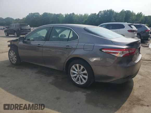 2018 Toyota Camry LE с VIN 4T1B11HK1JU118582, выставлен на аукционе Copart как лот 57972895 с пробегом 39 776 миль миль и Списание • Salvage title. История ставок и продаж доступна на DreamBid. Изображение 2.