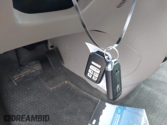 2014 Honda Odyssey Touring with VIN 5FNRL5H97EB117971, listed as a IAAI auction lot 41794324 with 198,191 mi miles and . Bid and sale history available at DreamBid. Image 11.