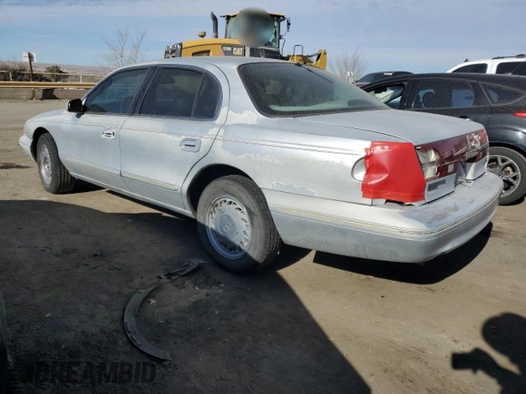 1996 Lincoln Continental z VIN 1LNLM97V3TY627803, wystawiony jako Copart lot #87036654 z przebiegiem 118 078 mil mil oraz Szkoda całkowita • Salvage title. Historia ofert i sprzedaży dostępna na DreamBid. Obrazek 2.