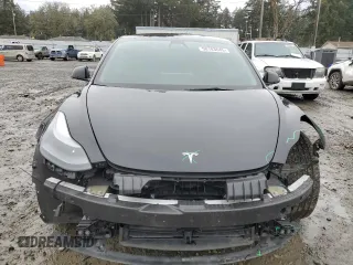 2023 Tesla Model 3 Long Range with VIN 5YJ3E1EB9PF607217, listed as a Copart auction lot 50103645 with 82,198 mi miles and Salvage Title. Bid and sale history available at DreamBid. Image 5.