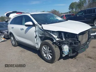 2018 Kia Sorento LX V6 with VIN 5XYPGDA57JG371874, listed as a IAAI auction lot 41668457 with 130,022 mi miles. Bid and sale history available at carsss.com. Image 1.