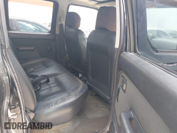 2001 Nissan Frontier SE with VIN 1N6ED27T81C305653, listed as a IAAI auction lot 42260643 with 245,547 mi miles and . Bid and sale history available at DreamBid. Image 8.