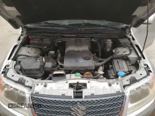 2012 Suzuki Grand Vitara Premium z VIN JS3TD0D2XC4100425, wystawiony jako Copart lot #49080815 z przebiegiem 108 780 mil mil oraz Szkody całkowita. Historia ofert i sprzedaży dostępna na DreamBid. Obrazek 12.