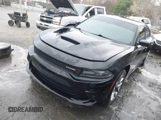 2021 Dodge Charger GT with VIN 2C3CDXHG4MH616382, listed as a IAAI auction lot 41908322 with 99,158 mi miles and . Bid and sale history available at DreamBid. Image 2.