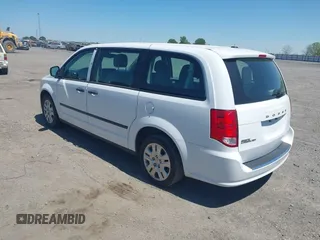 2015 Dodge Grand Caravan American Value with VIN 2C4RDGBG1FR748088, listed as a IAAI auction lot 42052160 with 248,540 mi miles and . Bid and sale history available at DreamBid. Image 3.