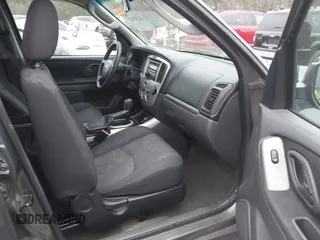 2006 Mazda Tribute S with VIN 4F2YZ04196KM12510, listed as a IAAI auction lot 41382627 with 242,650 mi miles and . Bid and sale history available at DreamBid. Image 5.
