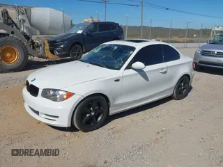 2009 BMW 1 Series 128i with VIN WBAUP73539VK75338, listed as a IAAI auction lot 40643882 with 116,970 mi miles and . Bid and sale history available at carsss.com. Image 2.