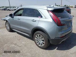 2023 Cadillac XT4 AWD Premium Luxury with VIN 1GYFZDR47PF163923, listed as a IAAI auction lot 42136236 with 52,012 mi miles and . Bid and sale history available at DreamBid. Image 3.
