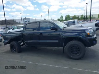 2011 Toyota Tacoma with VIN 3TMLU4EN5BM075967, listed as a IAAI auction lot 42228409 with 158,241 mi miles and . Bid and sale history available at DreamBid. Image 14.