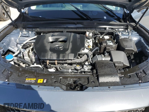 2025 Mazda CX-50 S Select with VIN 7MMVABAMXSN301011, listed as a Copart auction lot 77063504 with Not Provided miles and Salvage Title. Bid and sale history available at DreamBid. Image 11.