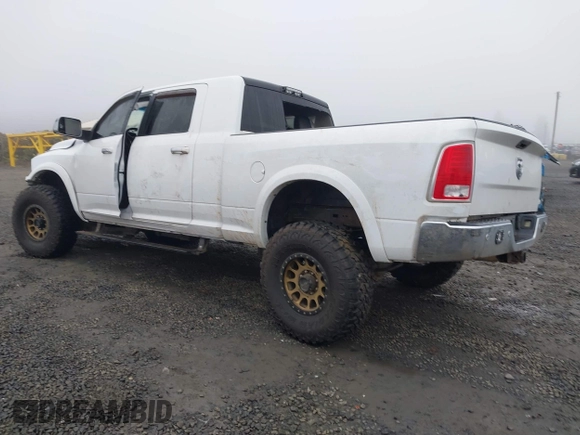 2016 Ram 2500 Laramie with VIN 3C6UR5NL2GG287071, listed as a IAAI auction lot 40989387 with 104,781 mi miles and . Bid and sale history available at DreamBid. Image 3.
