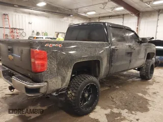 2014 Chevrolet Silverado 1500 LT with VIN 3GCUKRECXEG503427, listed as a IAAI auction lot 41526582 with 130,070 mi miles and . Bid and sale history available at DreamBid. Image 4.