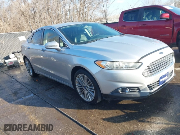 2013 Ford Fusion SE с VIN 3FA6P0H99DR184794, выставлен на аукционе IAAI как лот 41120431 с пробегом 127 376 миль миль и . История ставок и продаж доступна на DreamBid. Изображение 1.