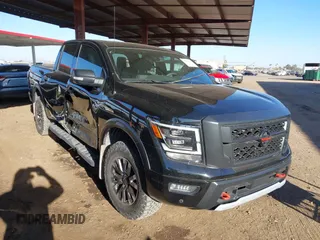 2021 Nissan Titan Pro-4X with VIN 1N6AA1ED3MN512957, listed as a IAAI auction lot 41374779 with 37,935 mi miles and . Bid and sale history available at DreamBid. Image 1.