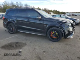2018 Mercedes-Benz GLS 63 AMG with VIN 4JGDF7FE5JB060580, listed as a Copart auction lot 74040014 with 62,749 mi miles and Salvage title. Bid and sale history available at DreamBid. Image 4.