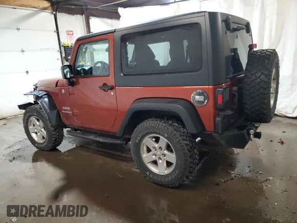 2014 Jeep Wrangler Sport with VIN 1C4AJWAG7EL197285, listed as a Copart auction lot 63451105 with 141,547 mi miles and Salvage title. Bid and sale history available at DreamBid. Image 2.