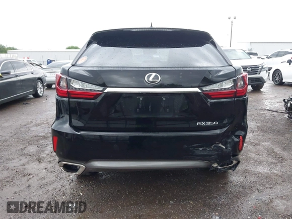 2016 Lexus RX 350 z VIN 2T2ZZMCA6GC005692, wystawiony jako IAAI lot #42147337 z przebiegiem 132 363 mil mil oraz . Historia ofert i sprzedaży dostępna na DreamBid. Obrazek 16.