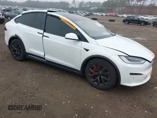 2022 Tesla Model X Plaid with VIN 7SAXCBE67NF339557, listed as a IAAI auction lot 41825360 with 70 mi miles and . Bid and sale history available at DreamBid. Image 1.