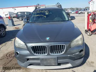 2014 BMW X1 sDrive28i with VIN WBAVM1C57EVW52502, listed as a IAAI auction lot 41702746 with 165,089 mi miles. Bid and sale history available at carsss.com. Image 12.