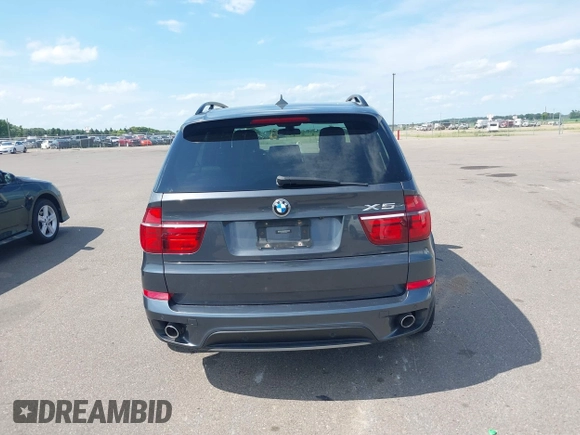2012 BMW X5 35d with VIN 5UXZW0C56CL664575, listed as a IAAI auction lot 42559674 with 157,554 mi miles and . Bid and sale history available at DreamBid. Image 16.