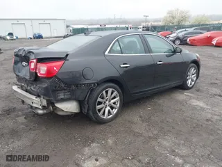 2013 Chevrolet Malibu LTZ with VIN 1G11H5SA7DF177897, listed as a IAAI auction lot 41984307 with 265,840 mi miles. Bid and sale history available at carsss.com. Image 4.