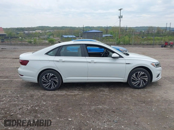2020 Volkswagen Jetta SEL z VIN 3VWEB7BU3LM073029, wystawiony jako IAAI lot #42168239 z przebiegiem 59 395 mil mil oraz . Historia ofert i sprzedaży dostępna na DreamBid. Obrazek 13.