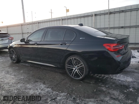 2018 BMW 7 Series 740e xDrive iPerformance with VIN WBA7J2C59JG938180, listed as a Copart auction lot 85343184 with 35,860 mi miles and Salvage Title. Bid and sale history available at carsss.com. Image 2.