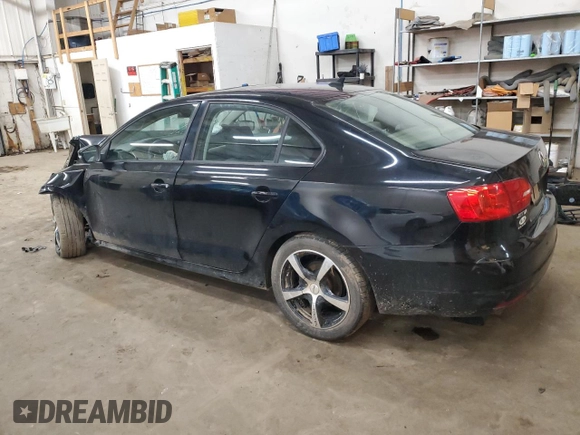 2012 Volkswagen Jetta TDI w/Premium with VIN 3VWLL7AJ7CM328048, listed as a Copart auction lot 54978425 with 148,927 mi miles and Non repairable. Bid and sale history available at DreamBid. Image 2.