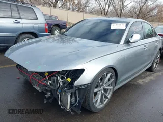 2014 Audi S6 Prestige with VIN WAUF2AFC5EN060536, listed as a IAAI auction lot 41238240 with 122,612 mi miles. Bid and sale history available at carsss.com. Image 2.