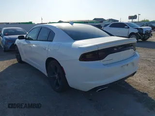2015 Dodge Charger SXT with VIN 2C3CDXHG8FH730145, listed as a IAAI auction lot 42039927 with 156,135 mi miles and . Bid and sale history available at DreamBid. Image 3.