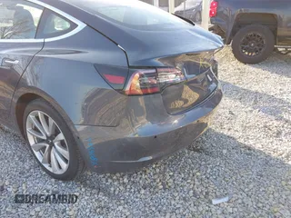 2020 Tesla Model 3 Long Range with VIN 5YJ3E1EB9LF795408, listed as a IAAI auction lot 41735428 with 56,013 mi miles. Bid and sale history available at carsss.com. Image 21.
