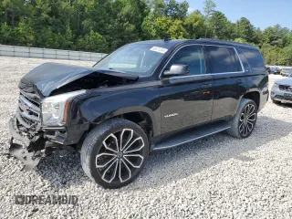 2015 GMC Yukon SLT with VIN 1GKS2BKC2FR666386, listed as a Copart auction lot 68471204 with 154,041 mi miles and Salvage Title. Bid and sale history available at carsss.com. Image 1.
