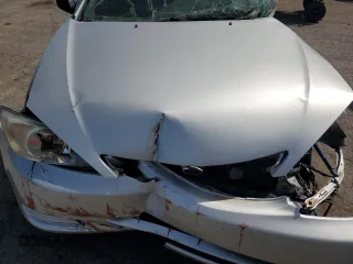 2005 Toyota Camry STD z VIN 4T1BE32K25U091780, wystawiony jako Copart lot #55323955 z przebiegiem Nie podano mil oraz Szkoda całkowita • Salvage title. Historia ofert i sprzedaży dostępna na DreamBid. Obrazek 11.