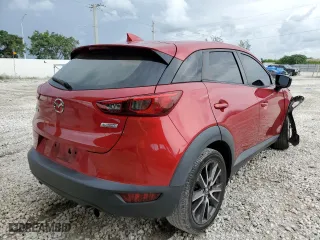 2017 Mazda CX-3 Touring with VIN JM1DKDC73H0163586, listed as a Copart auction lot 59118572 with 47,617 mi miles. Bid and sale history available at carsss.com. Image 4.