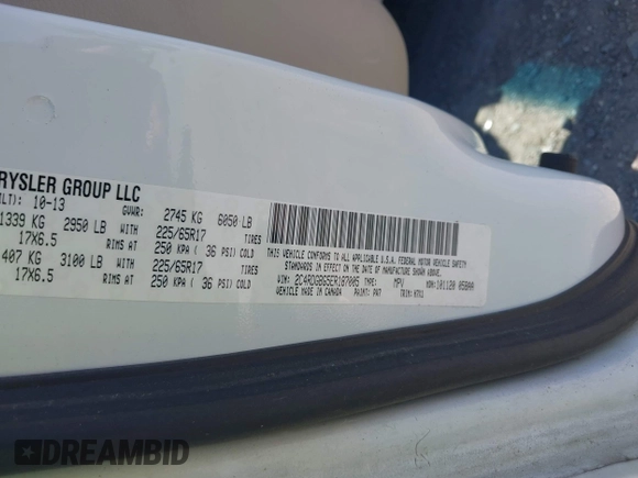 2014 Dodge Grand Caravan American Value with VIN 2C4RDGBG5ER187005, listed as a IAAI auction lot 42018333 with 216,149 mi miles and . Bid and sale history available at DreamBid. Image 9.