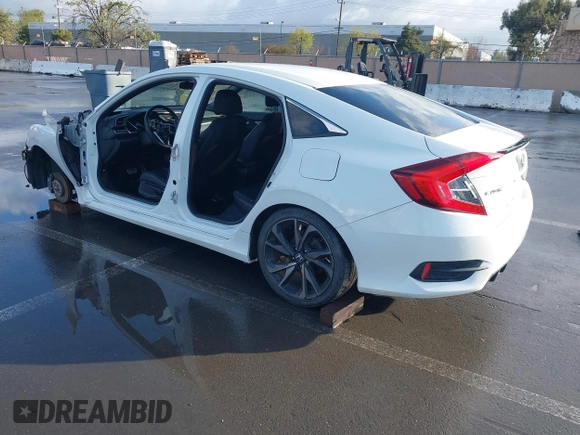 2019 Honda Civic Sport with VIN 19XFC2F86KE215368, listed as a IAAI auction lot 41934715 with 50,253 mi miles and . Bid and sale history available at DreamBid. Image 3.
