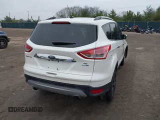 2016 Ford Escape SE z VIN 1FMCU9GX8GUA92661, wystawiony jako IAAI lot #41085877 z przebiegiem 76 632 mil mil oraz . Historia ofert i sprzedaży dostępna na DreamBid. Obrazek 4.